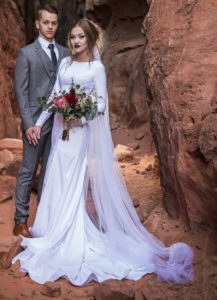 fitted crape wedding dress with long sleeves